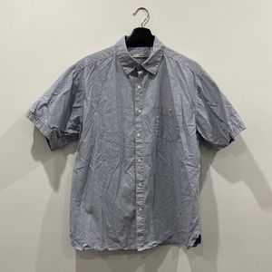 Dotted short sleeve button up shirt. Baby blue. L